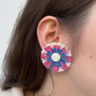 Recycled plastic stud earrings, floral shaped, with a natural shell.