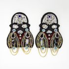Statement earrings with rhinestones and glitter